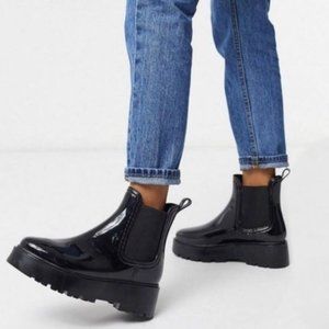 Chunky Lug Sole Chelsea Rain Boots in Black Shine.